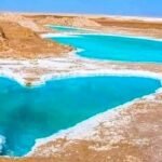 Turquoise salt lake in Siwa Oasis