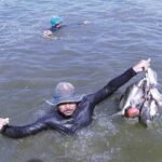 Bathing in a salt lake in Siwa Oasis